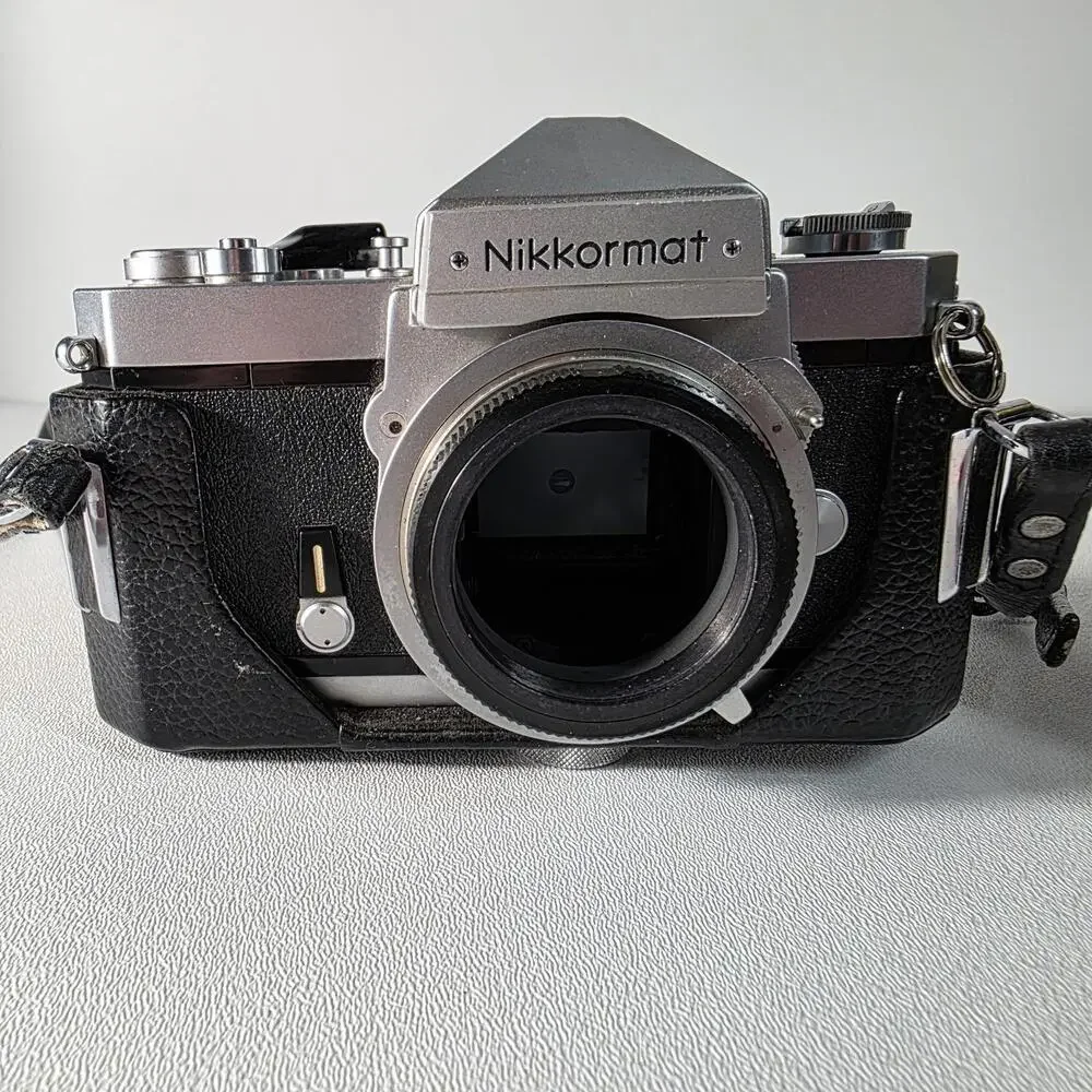 Nikon Nikkormat FT Film Camera Silver with Half Case & Accura 500mm Lens